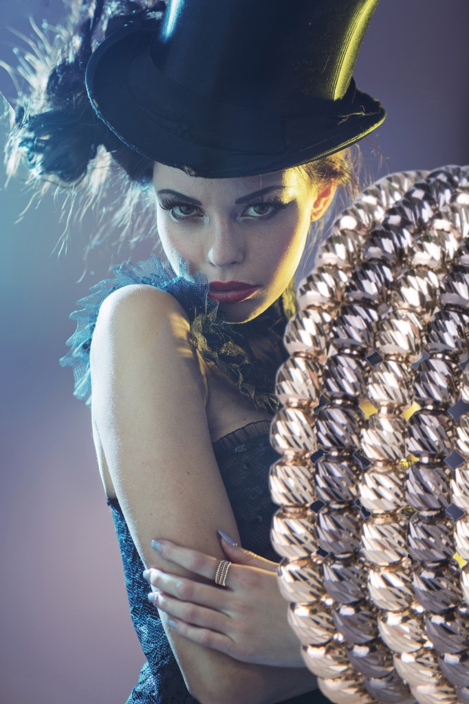 Portrait of the alluring young female model with the top hat